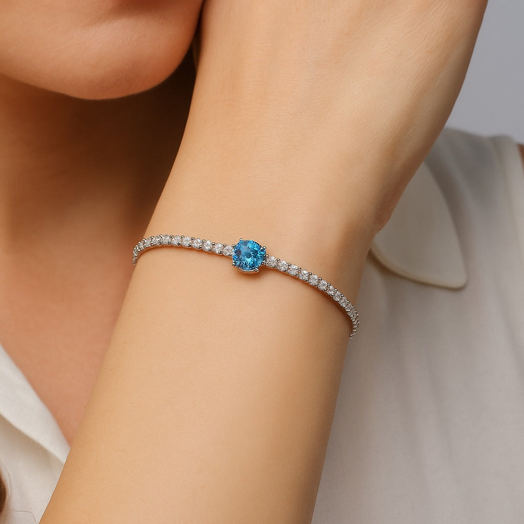 Elegant Silver Tennis Bracelet with Blue Crystal Centerpiece